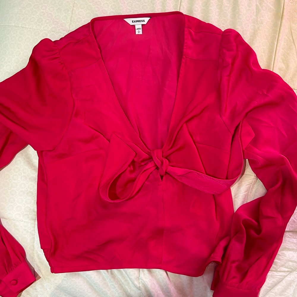 Express got pink blouse. Size small.